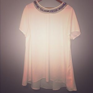 White top with beaded collar, peplum style